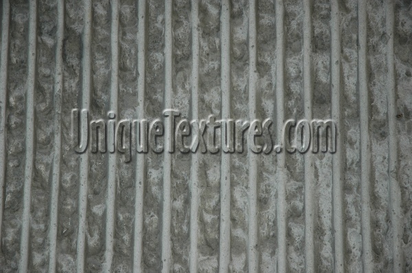 vertical pattern industrial concrete gray fence  