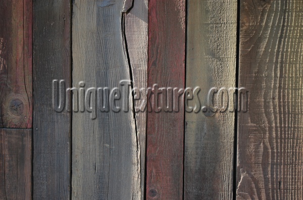 fence wall vertical cracked/chipped weathered architectural wood gray boards