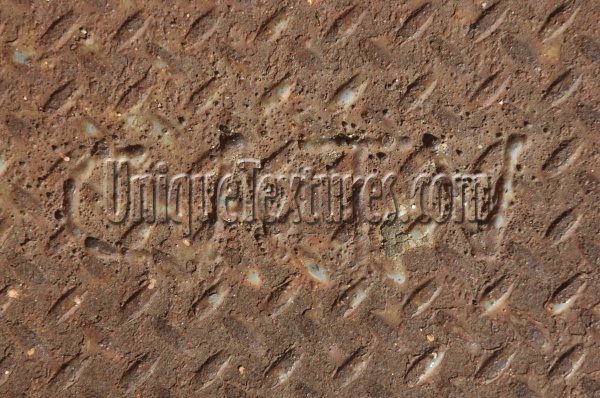 manhole diamonds pattern textual rusty industrial metal dark brown