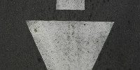 street symbol vertical        triangular vehicle asphalt white
