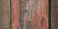 fence vertical weathered scratched architectural wood red boards