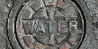manhole round textual industrial metal gray   