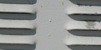 white paint metal industrial shadow horizontal vent/drain