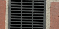 street vent/drain square pattern industrial architectural metal brick gray