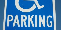 blue white paint metal vehicle textual sign symbol