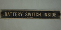 gray metal industrial mech/elec textual rectangular horizontal sign